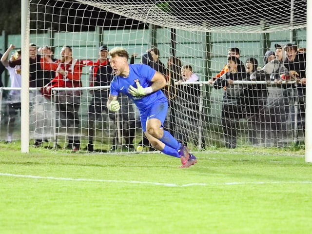 Luke Deacon has just saved Jamie Wrapson's penalty, sending Fareham through to the final. Picture by Ken Walker