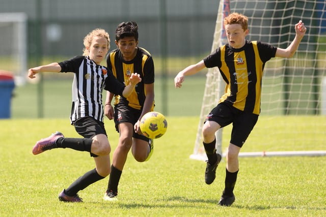 Action from the Clanfield youth football tournament at Horndean Technology College. Picture: Keith Woodland (270521-497)