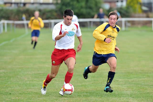 Gosport Borough's Dan Wooden, left, takes on Moneyfields' Conor Bailey. Picture: Steve Reid