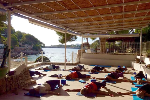 The private yoga decks overlooking the beach. Picture: Sardinia Yoga
