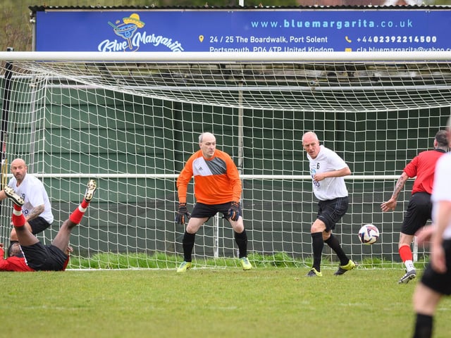 Action from the Jon Gittens memorial charity match between a team of former Fareham Town players and a side of ex-Pompey and Southampton professionals. Picture: Keith Woodland (160421-224)