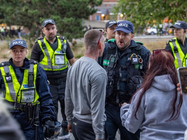 Policing the Anti-immigration protest near the UK Border Agency Building in Portsmouth. Picture: Mike Cooter (070824)
