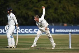 Felix Organ on his way to capturing four wickets on day three at Radlett. Photo by Alex Davidson/Getty Images.