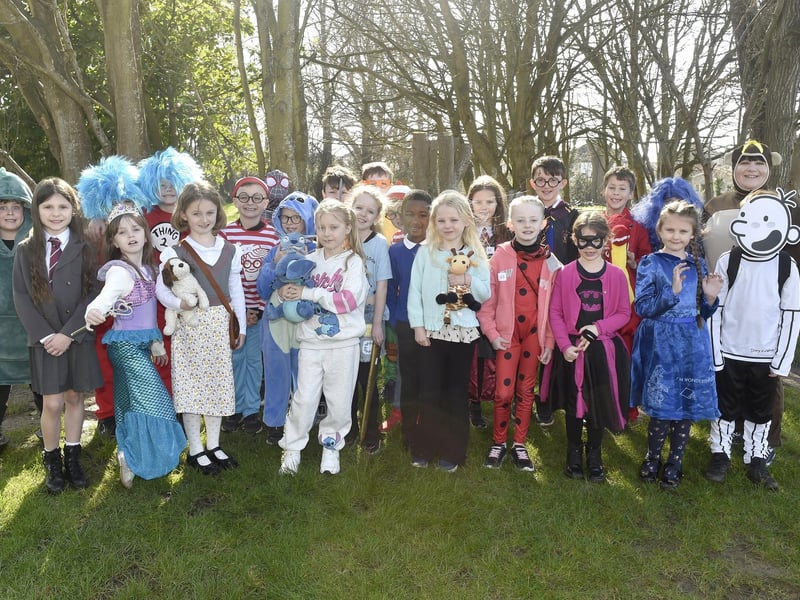 Gomer Junior School in Gosport, dressed as their favourite book characters, baked caked and took part in online quizzes to mark World Book Day.Pictured is: Where's Wally in class 3EG.Picture: Sarah Standing (070324-8502)