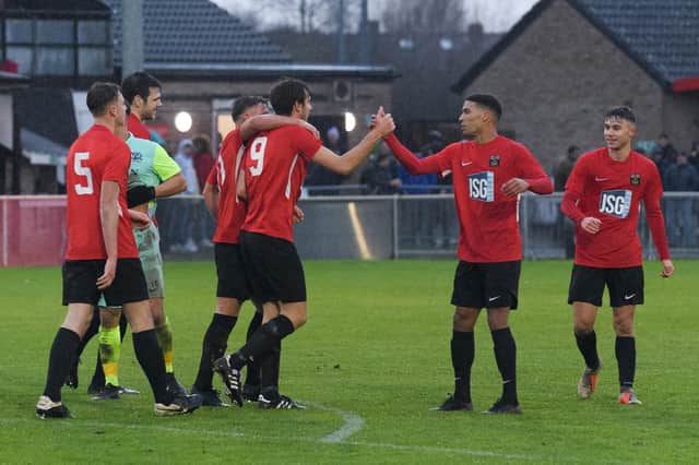 Fareham Town celebrate a goal in their FA Vase first round triumph against Roman Glass St George. They will now travel to Plymouth Parkway in the third round in April. Picture: Keith Woodland