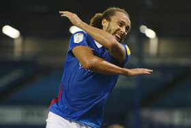 Marcus Harness celebrates scoring for Pompey against Colchester. Picture: Joe Pepler