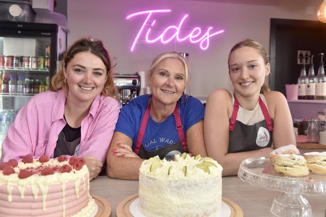 Tides Cafe in Lower Quay, Fareham, has recently reopened after a refurbishment.   Pictured is: (l-r) Charlotte Coles, Jackie Tribbeck, owner, and Ellie Rice.  Picture: Sarah Standing (030924-808)
