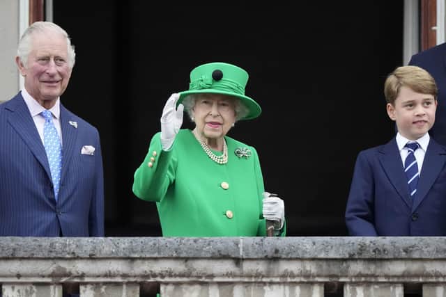 Queen Elizabeth II, the Prince of Wales and Prince George, on the balcony of Buckingham Palace at the end of the Platinum Jubilee Pageant on the last day of the four-day celebrations. Credit: Frank Augustein/PA Wire