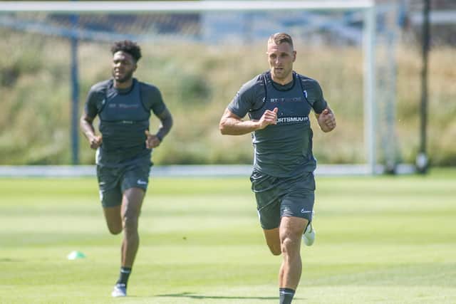 Lee Brown, right, with Ellis Harrison in Pompey pre-season training   Picture: Habibur Rahman