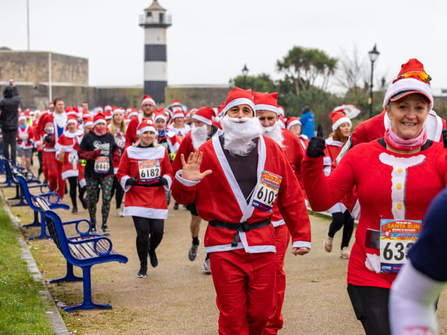 Thumbs up for the Santa Fun Run at Southsea Castle.