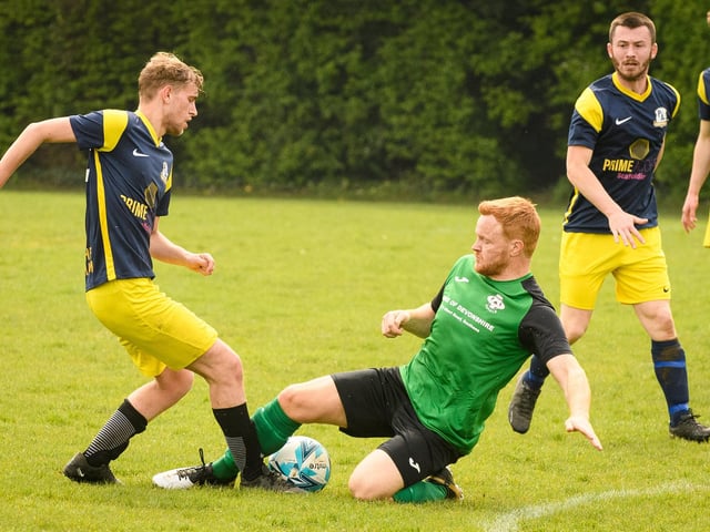 Action from Saturn Royale's 1-0 win over Pelham Arms (blue and yellow kit) in the second Adelaide Cup semi-final. Picture: Keith Woodland (300421-289)