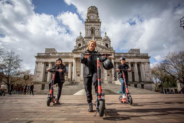 The e-scooter rental trial is going to launch in Portsmouth.

Pictured: Voi scooter team, Jon Hamer, Maria Sassetti and Nikolina Kotur on the e-scooters at Portsmouth Guildhall walk on 15 March 2021.
Picture: Habibur Rahman