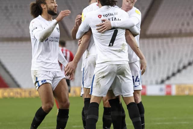 John Marquis is mobbed by his team-mates - including new strike partner Marcus Harness - in Saturday's 3-1 success at Sunderland. Picture: Daniel Chesterton/phcimages.com