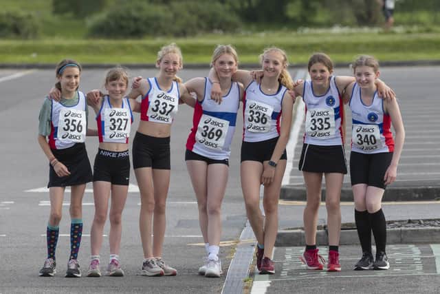 City of Portsmouth AC juniors ahead of the Lakeside Series 5k run. Picture by Paul Smith.