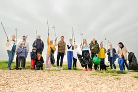 Pictured is: Stephen Morgan MP joined Rosie Gibbs (Right of) and her Mum, Sophie and other litter pickers. 

Picture: Keith Woodland (220421-2)