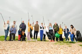 Pictured is: Stephen Morgan MP joined Rosie Gibbs (Right of) and her Mum, Sophie and other litter pickers. Picture: Keith Woodland (220421-2)