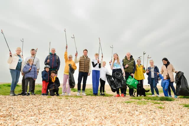 Pictured is: Stephen Morgan MP joined Rosie Gibbs (Right of) and her Mum, Sophie and other litter pickers.
Picture: Keith Woodland (220421-2)