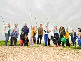 Pictured is: Stephen Morgan MP joined Rosie Gibbs (Right of) and her Mum, Sophie and other litter pickers. 

Picture: Keith Woodland (220421-2)