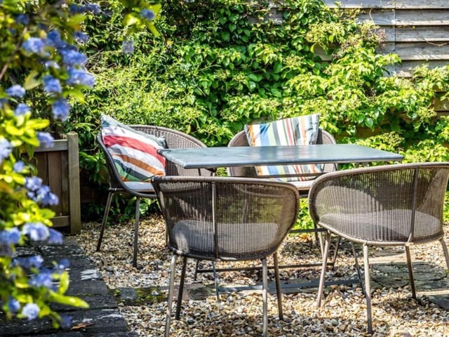 This property comes with four bedrooms, two bathrooms and four reception rooms as well as a spacious garden.