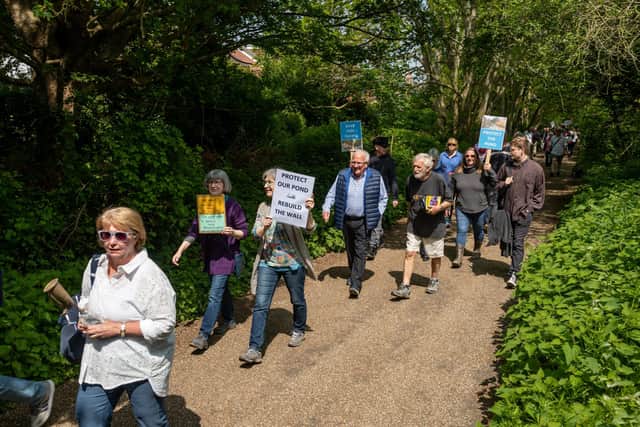Protestors at the march to save the sea defences and mill pond. Picture: Mike Cooter (150523)