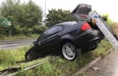 Car crashes through barrier. Pic HIWFRS