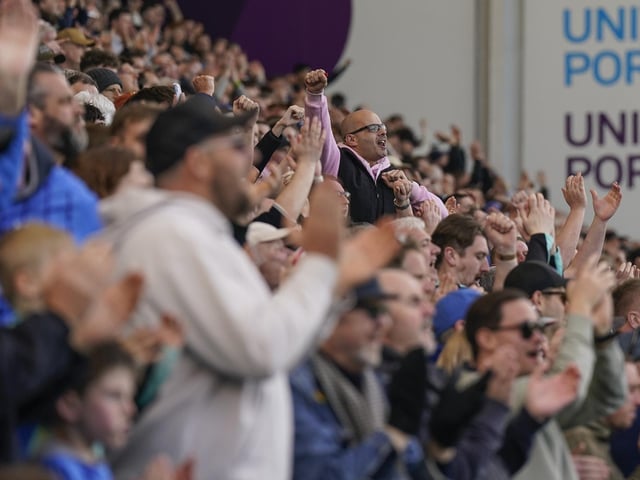 Pompey fans played a big role in carrying their team to a massive three points in their Championship survival battle against Blackburn Rovers.