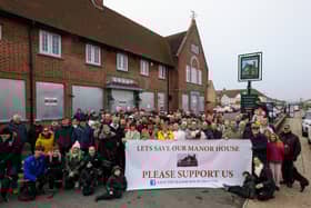 Campaigners outside the Manor House pub, Drayton, where they object to owners Greene King's closure of the community hub.
Picture: Chris Moorhouse