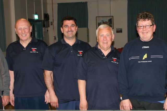 Neil Lockton, second left, helped Phoenix Satellites to a thrilling victory.