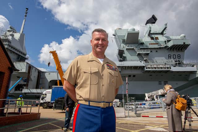 Colonel Simon Doran of the US Marine Corps in front of HMS Queen Elizabeth. There are 250 US Marines and sailors joining the Royal Navy on the flagship carrier.
Picture: Habibur Rahman