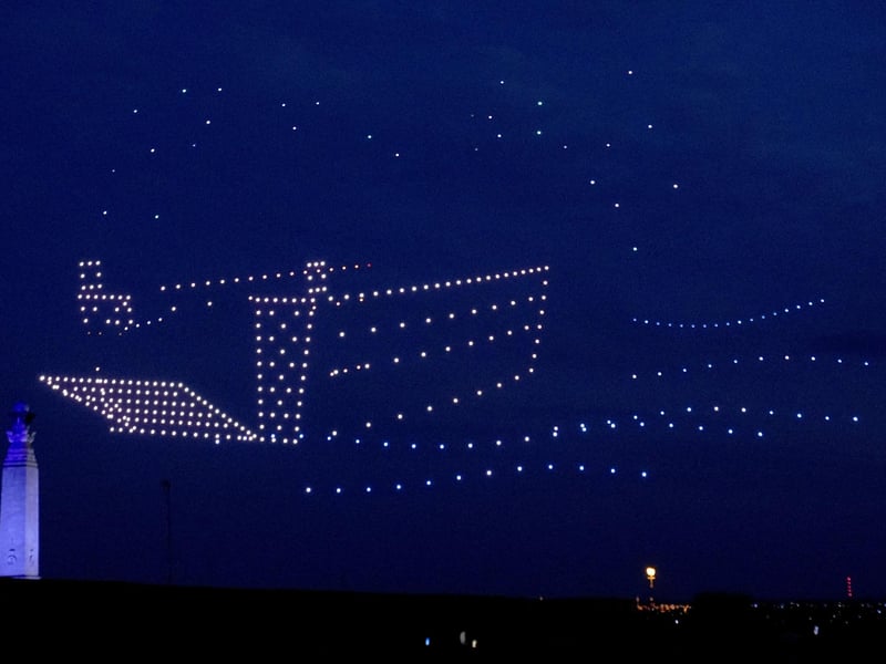 Drones make a landing craft during a drone display telling the story of D-Day. Photo: Andrew Matthews/PA Wire