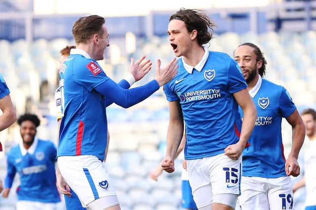 Rasmus Nicolaisen celebrates opening the scoring for Pompey against King's Lynn