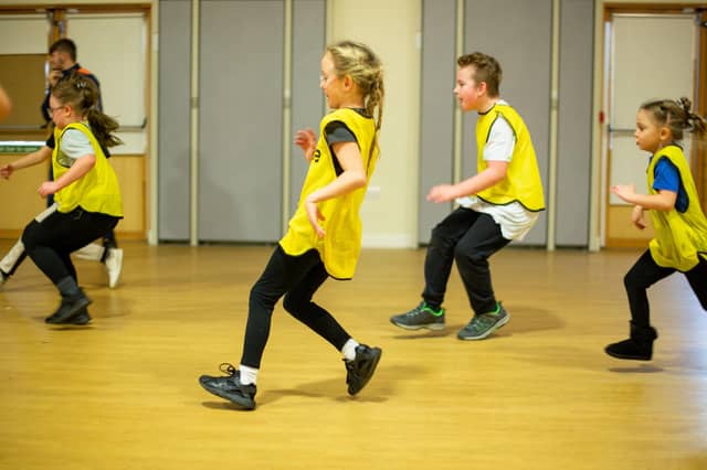 Children playing dodgeball at HAF Fun Pompey event