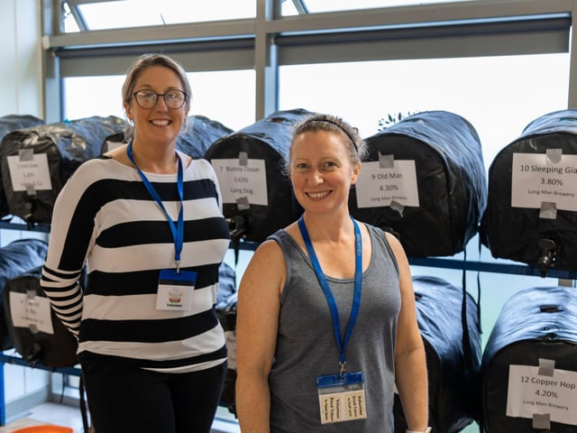 Pictured: Servers Gemma Utton (45) and Jane Dallimore (44) during their busy day at the Portchester Charity Beer Festival. Picture: Mike Cooter (220723)