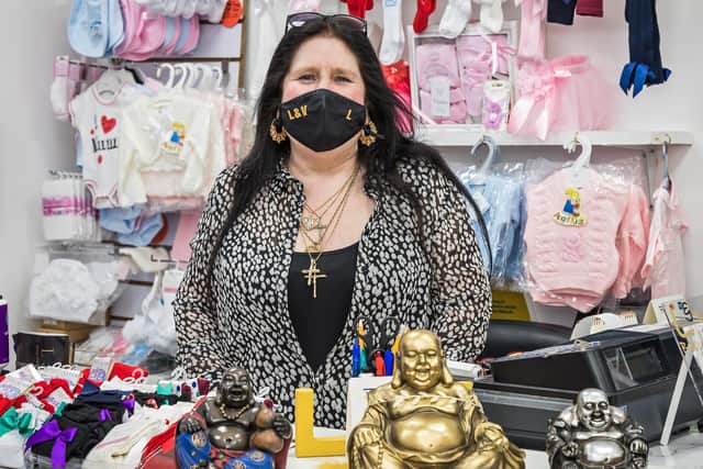 Lesley Gofton behind the counter of her shop L&V Baby, Children's and Dancewear. Picture: Mike Cooter (240621)
