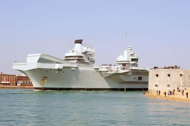 HMS Queen Elizabeth leaving Portsmouth Naval Base on Monday, April and heading up to Rosyth, Scotland, for dry-dock maintenance.

Picture: Sarah Standing (010419-4445)