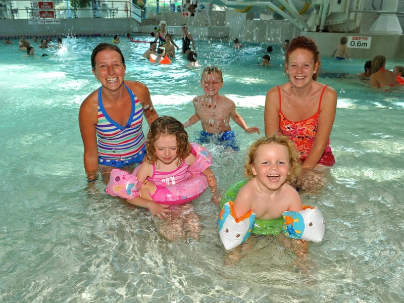 August 2010. Kate Fraiser (back right with her sons Liam (8,back) and Jude (4, front right) with Carly Allen (left) and her daughter Lily (4,front right) enjoying themselves at The Pyramids in Southsea which re-opened under new management. Picture: Steve Reid 102444-43