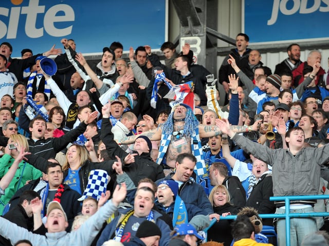 Pompey fans celebrate the Blues' FA Cup quarter-final victory over Birmingham City in March 2010.