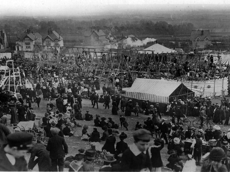 Taken from Cosham. The annual fair held on the downs of Portsdown Hill just above Southwick Hill Road and the house seen are on the old A3 going up the hill from Cosham.Most of the swings are Skye Boat swings. Picture: Costen.co.uk
