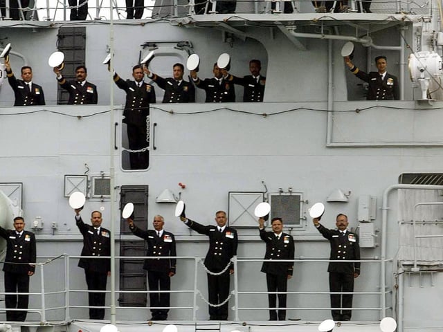 The crew of Indian ship the INS Mumbai salute as HMS Endurance, carrying Britain's Queen Elizabeth II, passes during the International Fleet Review at Spithead, off Portsmouth, Tuesday June 28, 2005. A total of 167 ships from the Royal Navy and 35 nations are taking part in the International Fleet Review at Spithead, off Portsmouth, as part of the Trafalgar 200 celebrations this week. See PA Story SEA Trafalgar. PRESS ASSOCIATION Photo. Photo credit should read: Gareth Fuller/PA