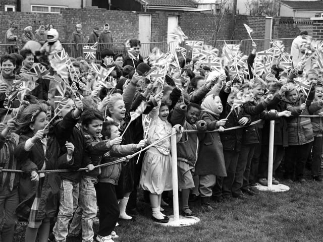 Local school children cheer the arrival of the Duke of Edinburgh at Harrison House, Stamshaw on the 24th March 1988.
Picture: (B3848-1)