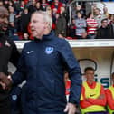 Darren Moore and Pompey boss Kenny Jackett before last season's Keepmoat Stadium encounter which the Blues won 2-1. Picture: Daniel Chesterton/PinPep