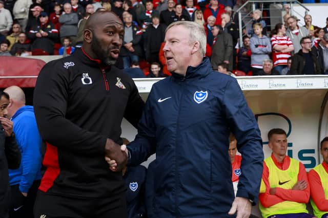 Darren Moore and Pompey boss Kenny Jackett before last season's Keepmoat Stadium encounter which the Blues won 2-1. Picture: Daniel Chesterton/PinPep