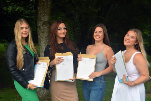 Year 11 students with their results