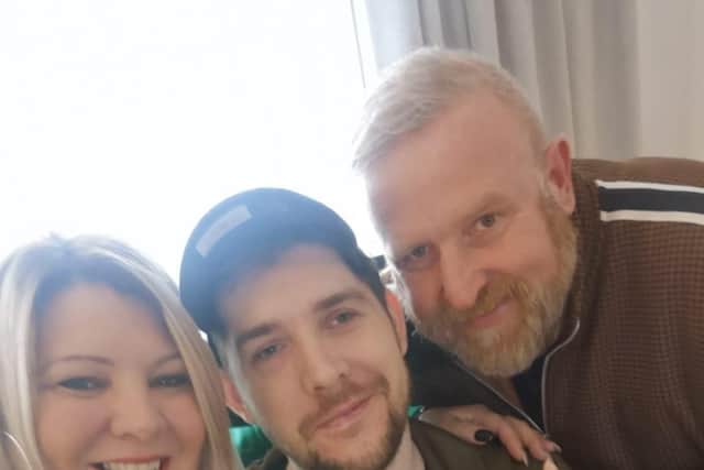 Josh Evans suffered a serious brain injury after a motocross accident in 2018. Jack Farrugia is leading fundraising efforts for him. Here, he is pictured with his mum, Maxine, and dad, Stephen. Picture: Maxine Evans.