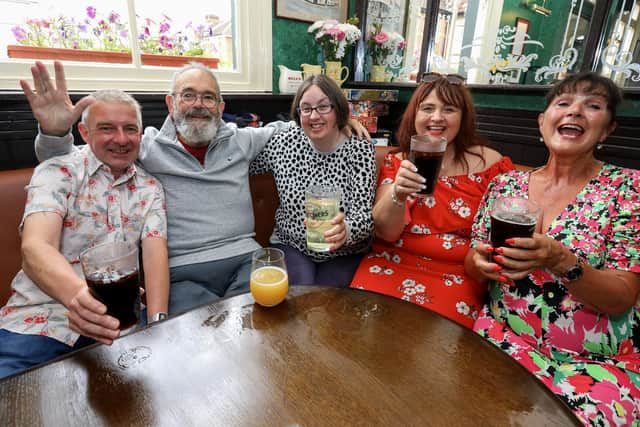 From left, Geoff Budd, Brian gGbbs, Anne-Marie Hayllar, Jane McKenzie and Karen Ruck. Reopening of The Lawrence Arms, Lawrence Road, Southsea, following it's closure in February due to a car crashing into it
Picture: Chris Moorhouse (jpns 080723-15)