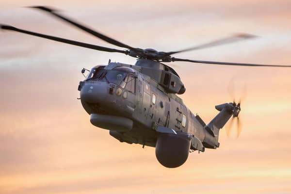 A Merlin helicopter pictured with the Crownest system fitted underneath it. Photo: Lockheed Martin