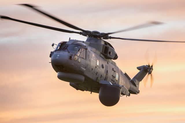 A Merlin helicopter pictured with the Crownest system fitted underneath it. Photo: Lockheed Martin