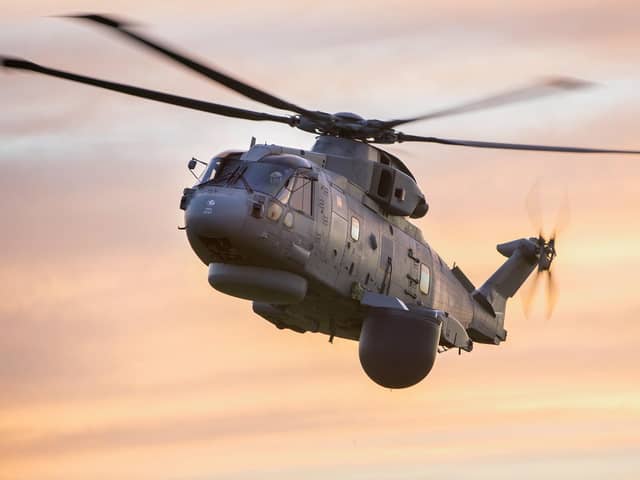 A Merlin helicopter pictured with the Crownest system fitted underneath it. Photo: Lockheed Martin