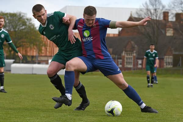Goalscorer Cameron Quirke in action for US Portsmouth against Brockenhurst. Picture: Neil Marshall