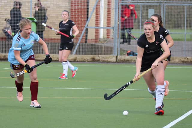 Sian Edwards on the ball against Old Georgians. Picture: Tris Page